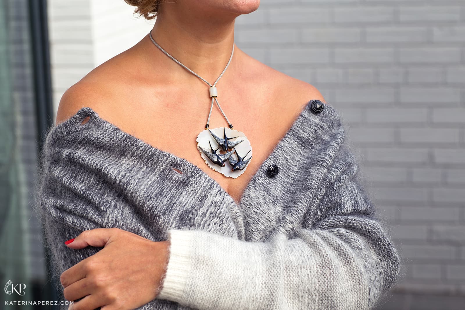 Ilgiz F. Mysterious China pendant with swallows adorned with hot enamel painting. Photo by Isabella Antonio