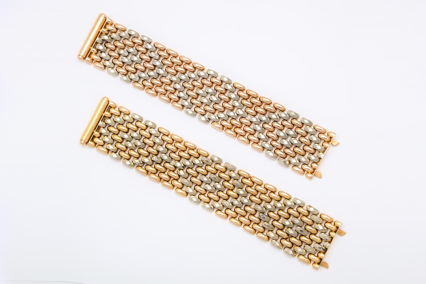  Weaved bracelets in yellow and white gold offered by A La Vieille Russie