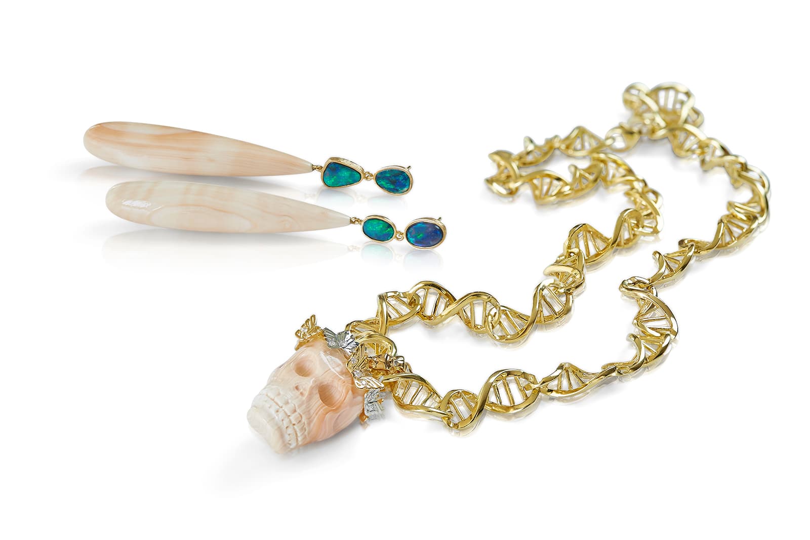 K Brunini earrings and necklace with Madargascan shell, repurposed 1920’s rock crystal pendulums, opals and Austalian pink diamonds in yellow gold