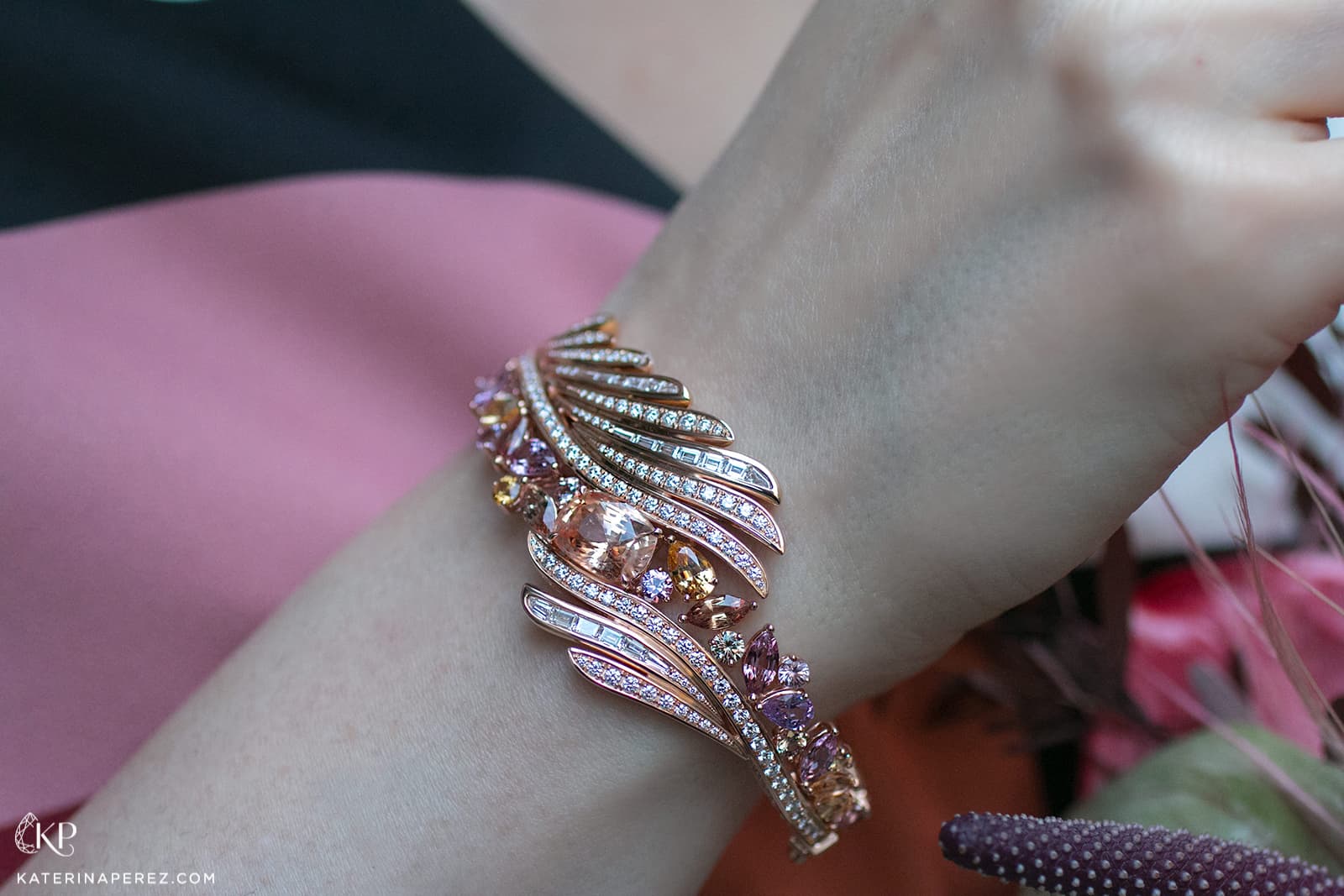 Gübelin 'Splendid Feather' bangle from Aurora collection featuring 5.60 cts padparadscha sapphire complemented by fancy colour sapphires and diamondse from Sri Lanka, 5.60 ct