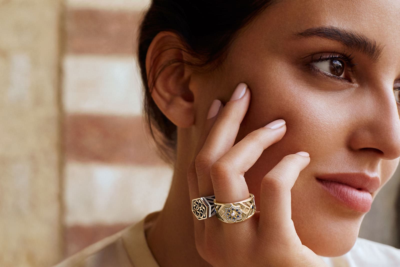  Azza Fahmy 'Mamluk' collection ‘Qalawun’ ring with diamonds, sapphires and pearls, and the  ‘Minaret’ ring, both in yellow gold and sterling silver