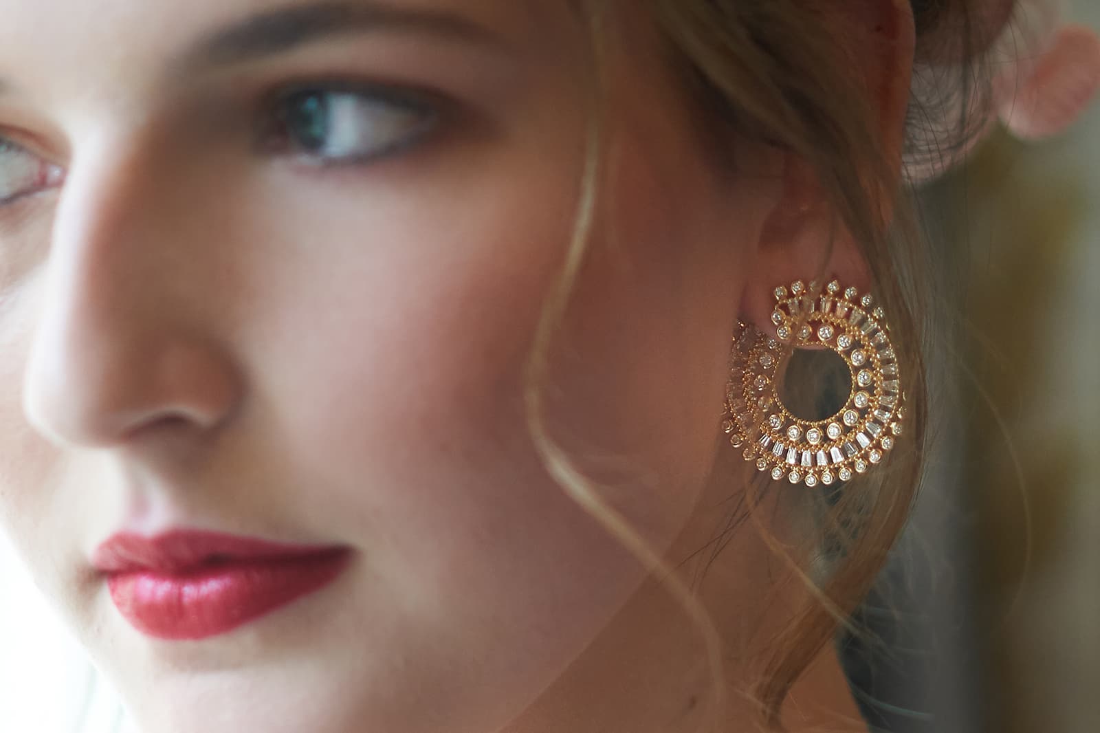  Althia Manou wearing HARAKH diamond and yellow gold earrings