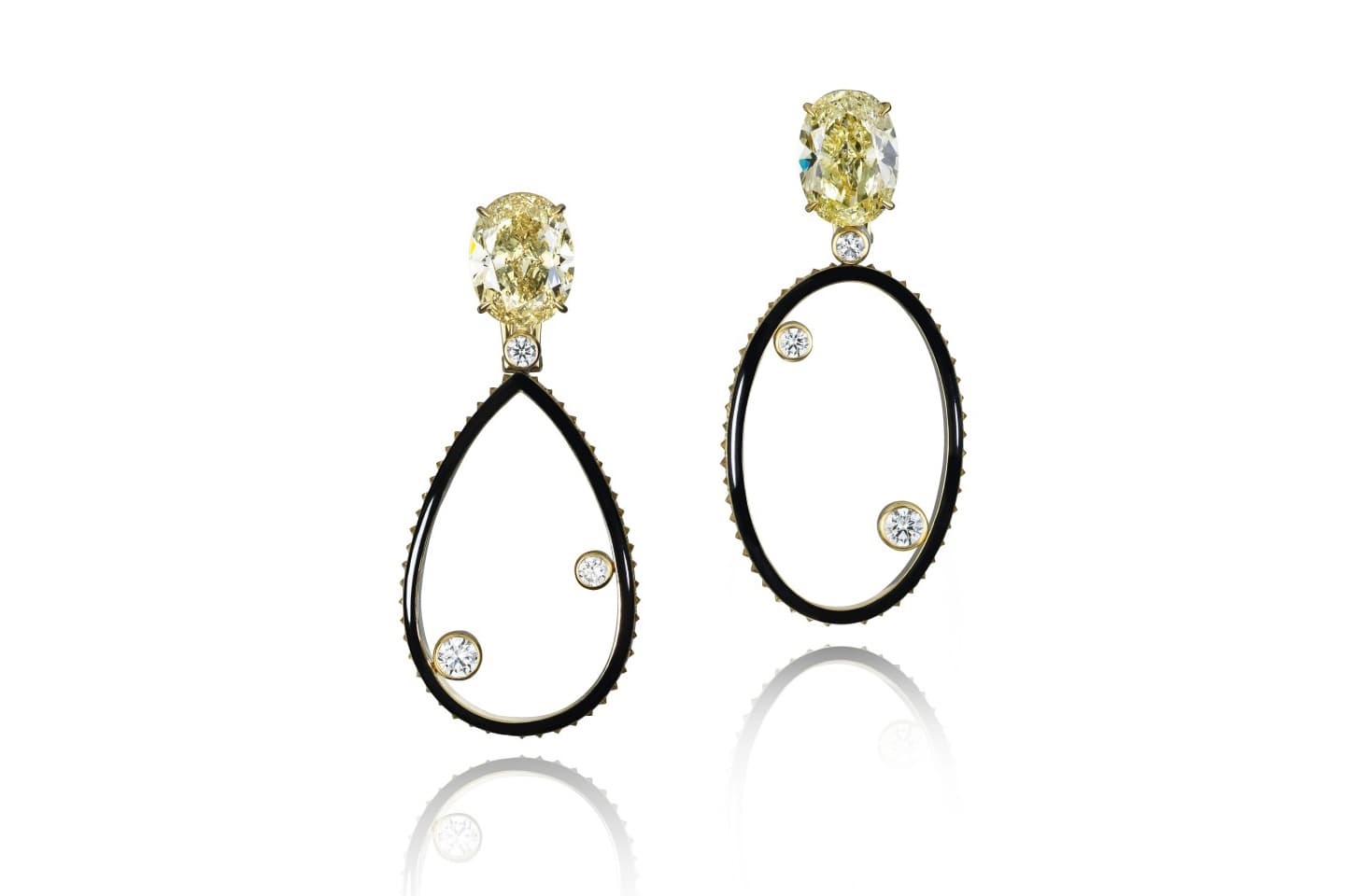  Sotheby’s Diamonds by Lily Gabriella ‘Orbit’ earrings with two oval cut Fancy Yellow diamonds, weighing 7.06ct and 7.25ct, yellow and colourless pavé set diamonds, and black enamel in yellow gold