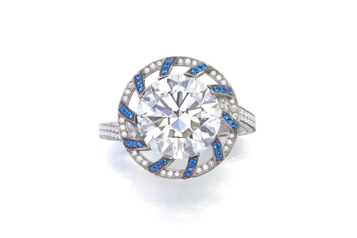  Joseph Ramsay ‘The Fabric of Jewellery’ collection ‘Skeleton Saxony’ ring with a 5.20ct D colour, Internally Flawless round brilliant cut diamond, pave set diamonds, blue sapphire and garnet in blackened white gold