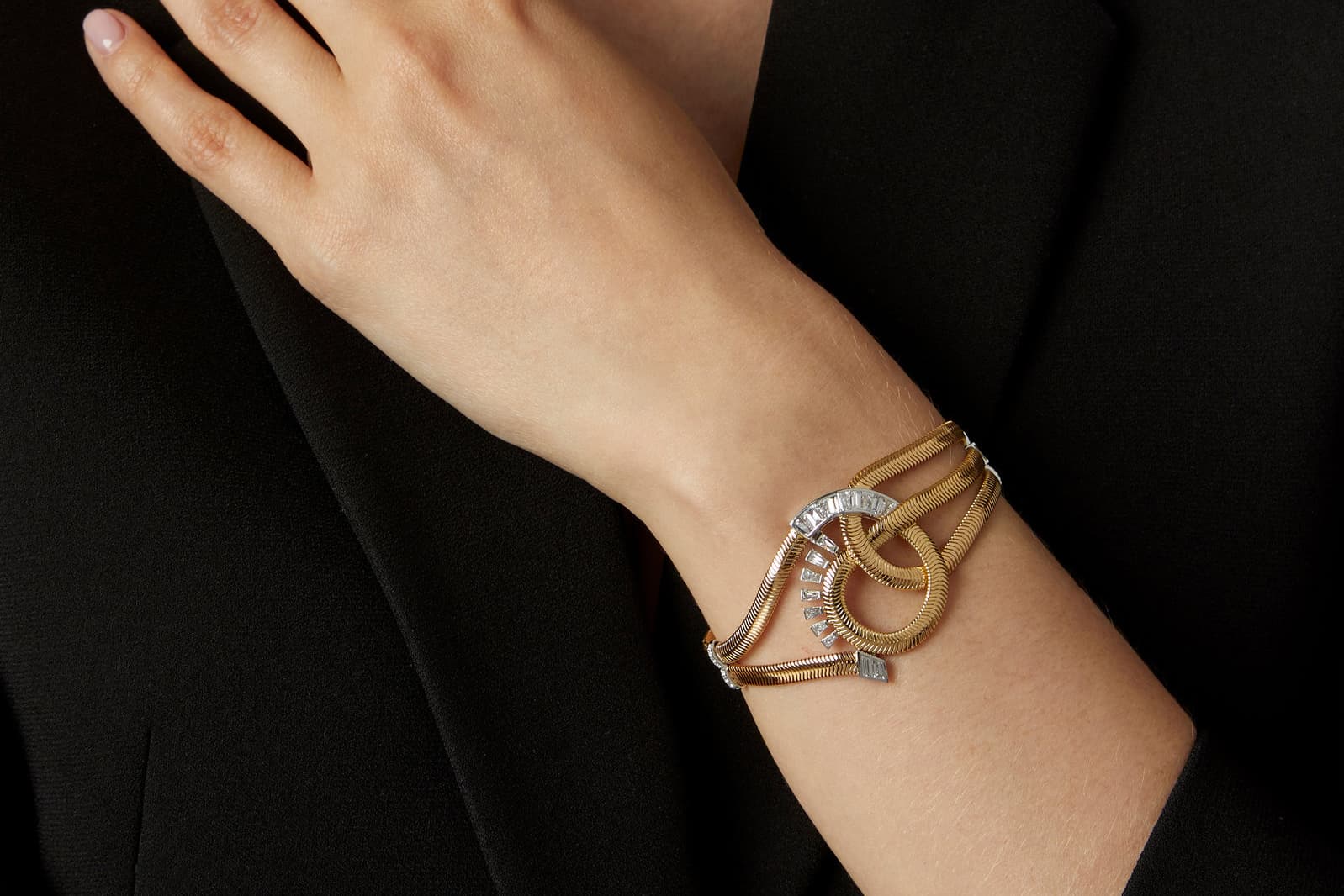Nikos Koulis ‘Feelings’ collection bracelet with diamonds in yellow and white gold