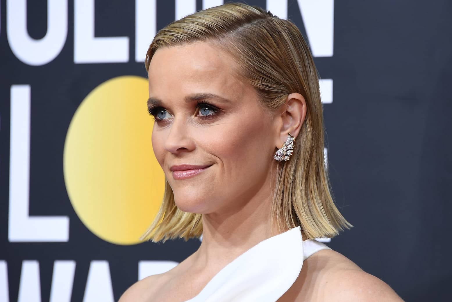  Reese Witherspoon wearing Tiffany&Co. Schlumberger earrings with diamonds in yellow gold and platinum