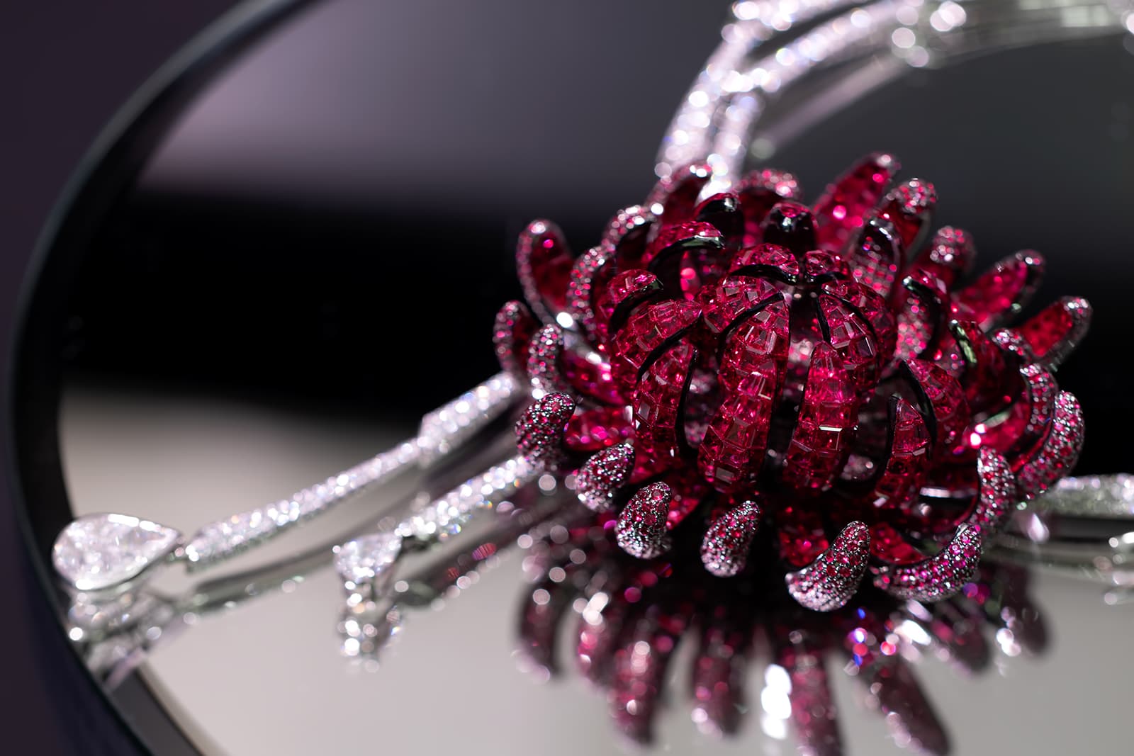 Stenzhorn The Noble Ones collection Chrysanthemum necklace with invisible set rubies and diamonds in white gold