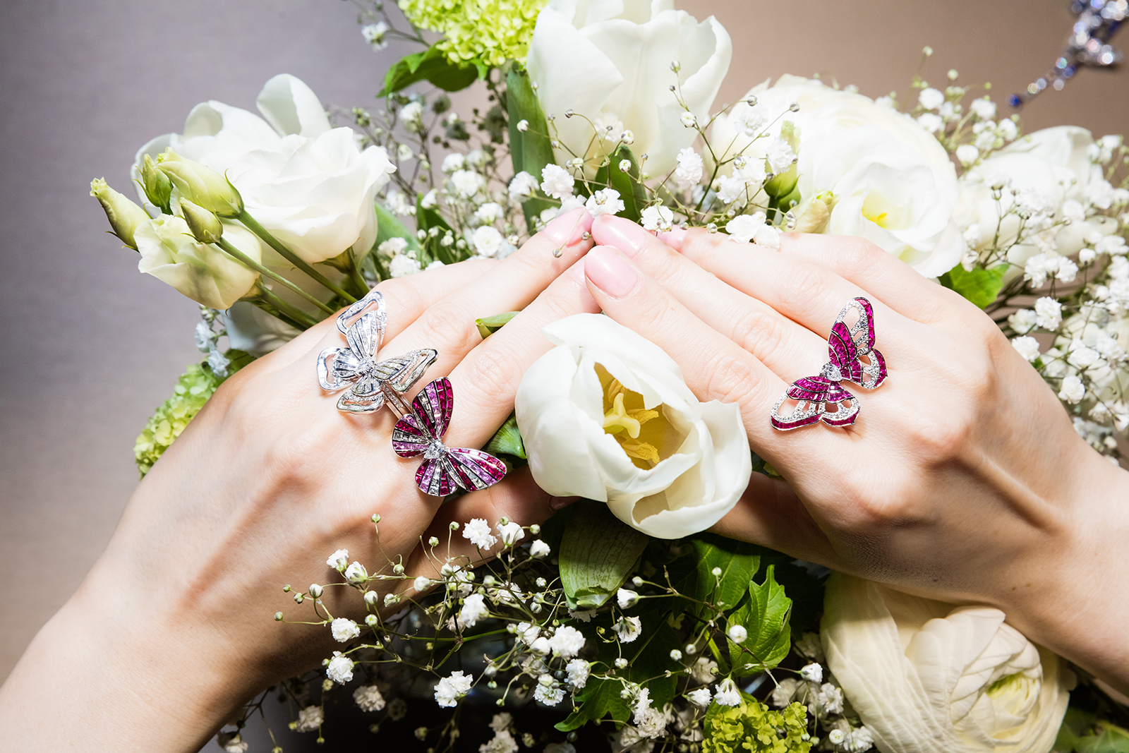 Stenzhorn Butterfly Lovers rings in diamonds, rubies and pink sapphires, with removable 'kimono' ring jackets in white gold