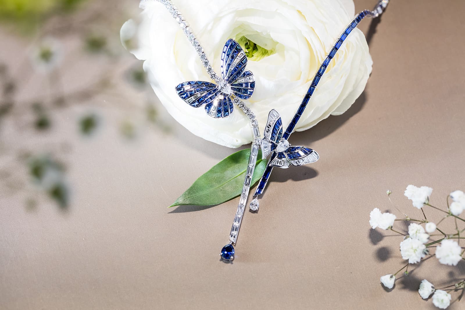 Stenzhorn Butterfly Lovers collection necklace with diamonds and sapphires in white gold