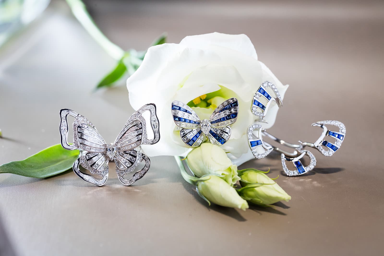 Stenzhorn Butterfly Lovers collection rings with diamonds and sapphires with removable 'kimono' ring jackets in white gold