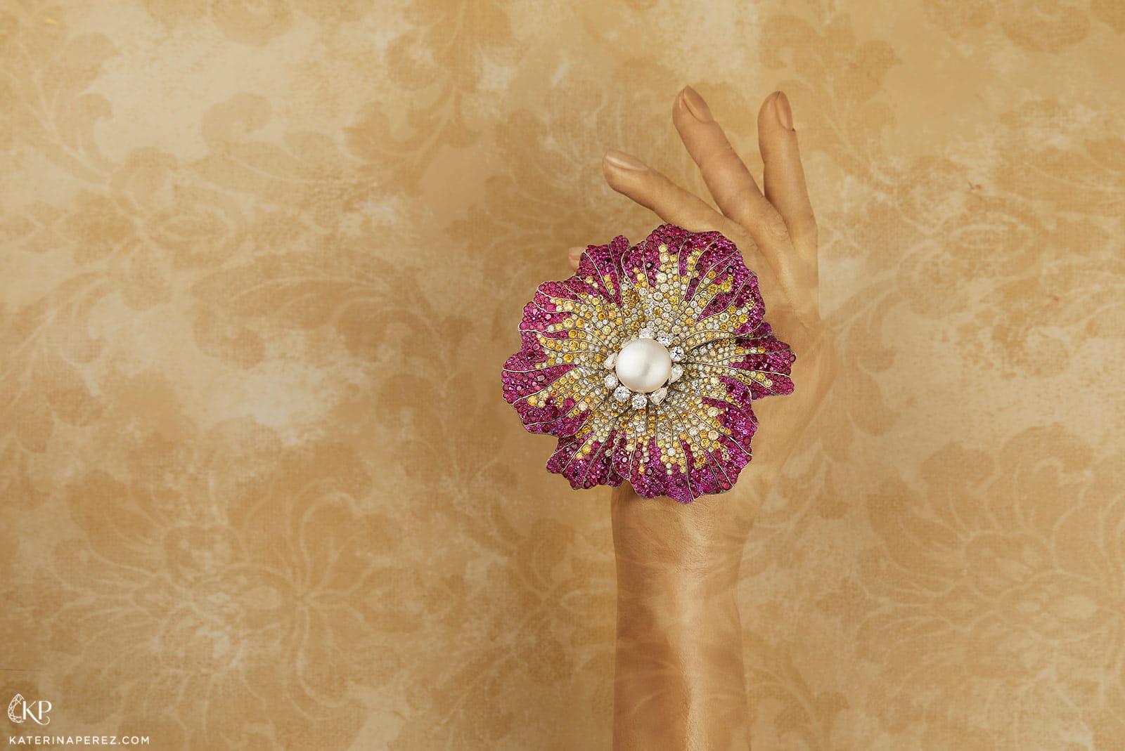 Moussaieff flower brooch with rubies, diamond and a pearl