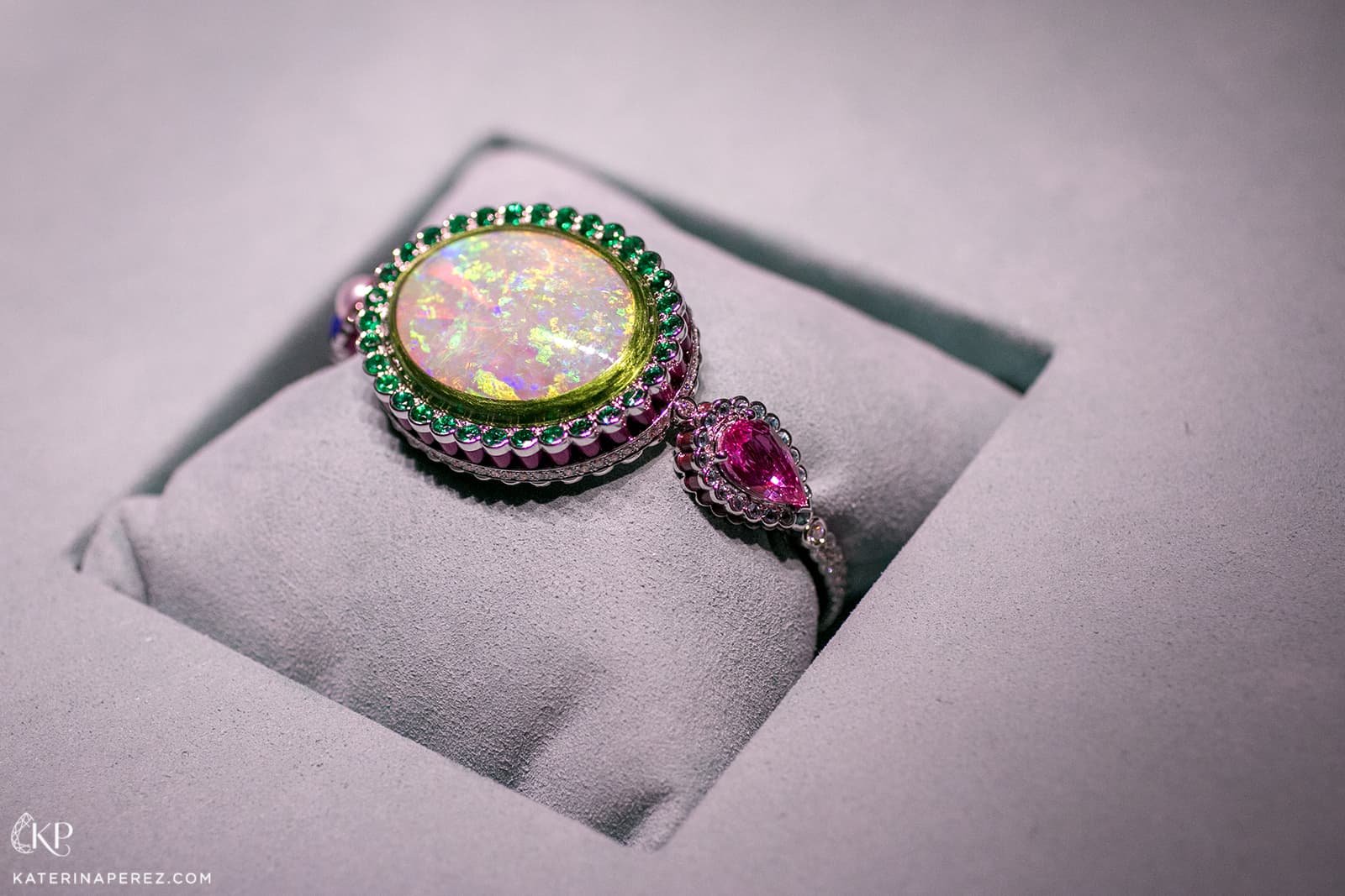 Dior et Moi collection secret watch with opal, pearl, sapphires, garnet, peridot, emerald and lacquer in white and pink gold