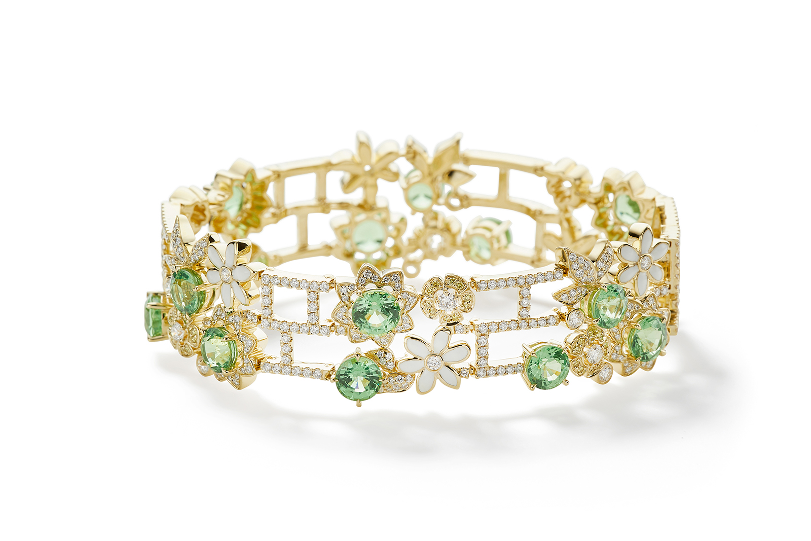 Boodles Secret Garden collection The Walled Garden bracelet with tsavorites, yellow sapphires, white enamel and diamonds in yellow gold