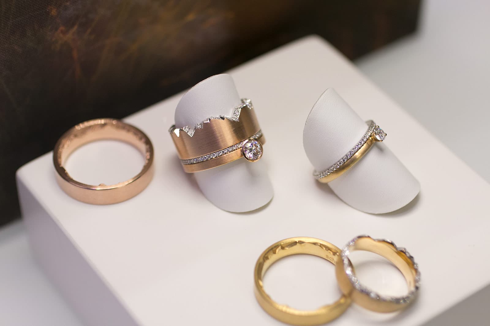 Schmukwerk rings with diamonds in rose and yellow gold