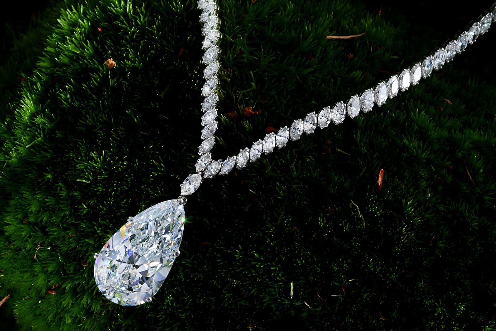 Offered by Symbolic & Chase, Harry Winston necklace owned by Cristina Onassis with 38ct central pear cut diamond and accenting diamonds in platinum
