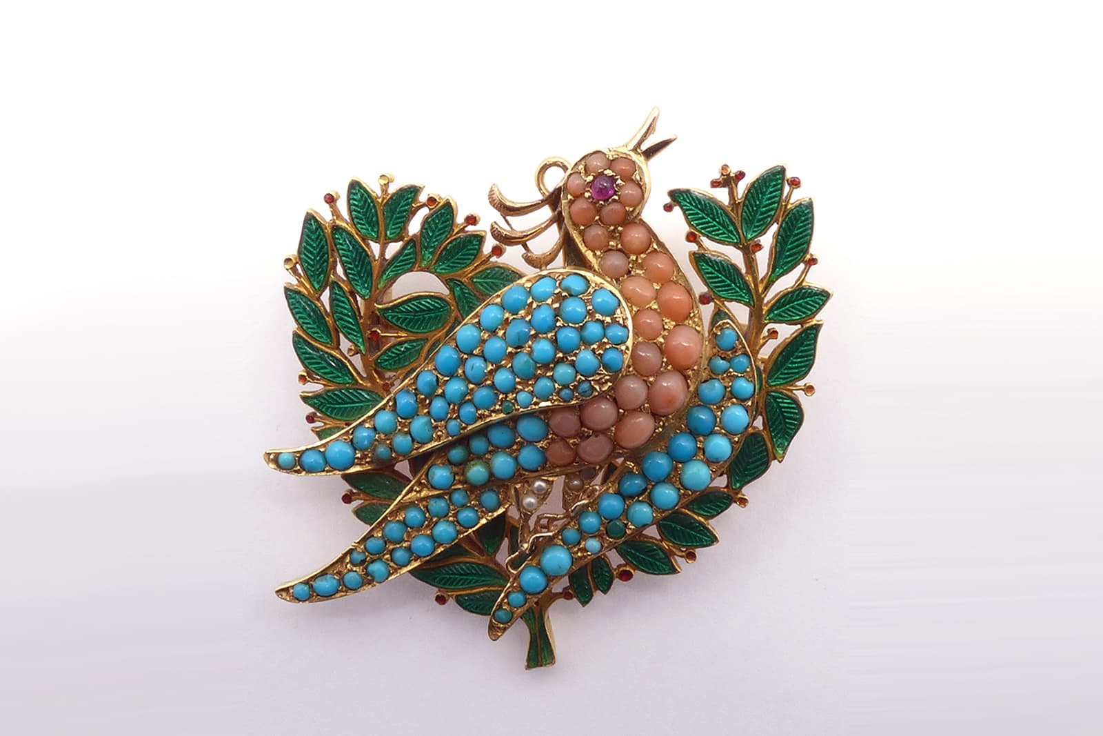  Offered by Wartski, Giuliano brooch with coral, turquoise, rubies, pearls and enamel in yellow gold