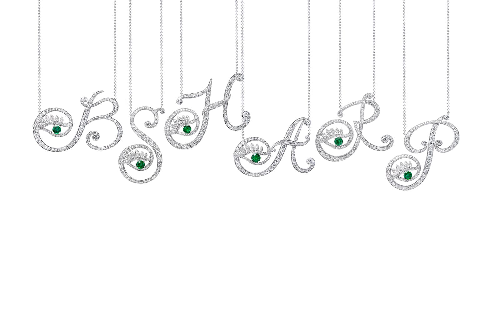  Tabayer alphabet pendants with emeralds and diamonds in white gold