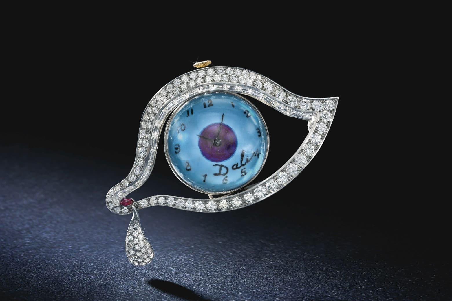 Salvador Dali The Eye of Time brooch with ruby and diamonds in white and yellow gold