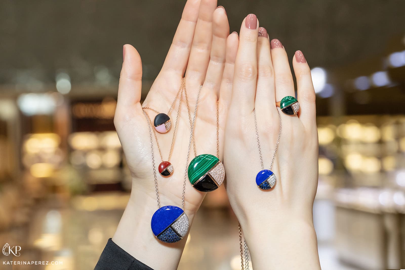 Luca Carati Twenties collection pendants with malachite, lapis lazuli, carnelian, onyx, pink opal, sapphires, diamonds. Photo by Simon Martner