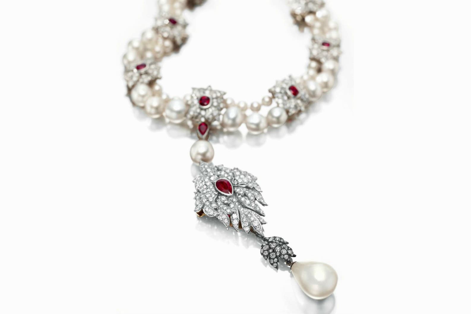 Elizabeth Taylor's La Peregrina Pearl necklace by Cartier with 55.95ct pear shaped pearl, accenting pearls, diamonds, and rubies