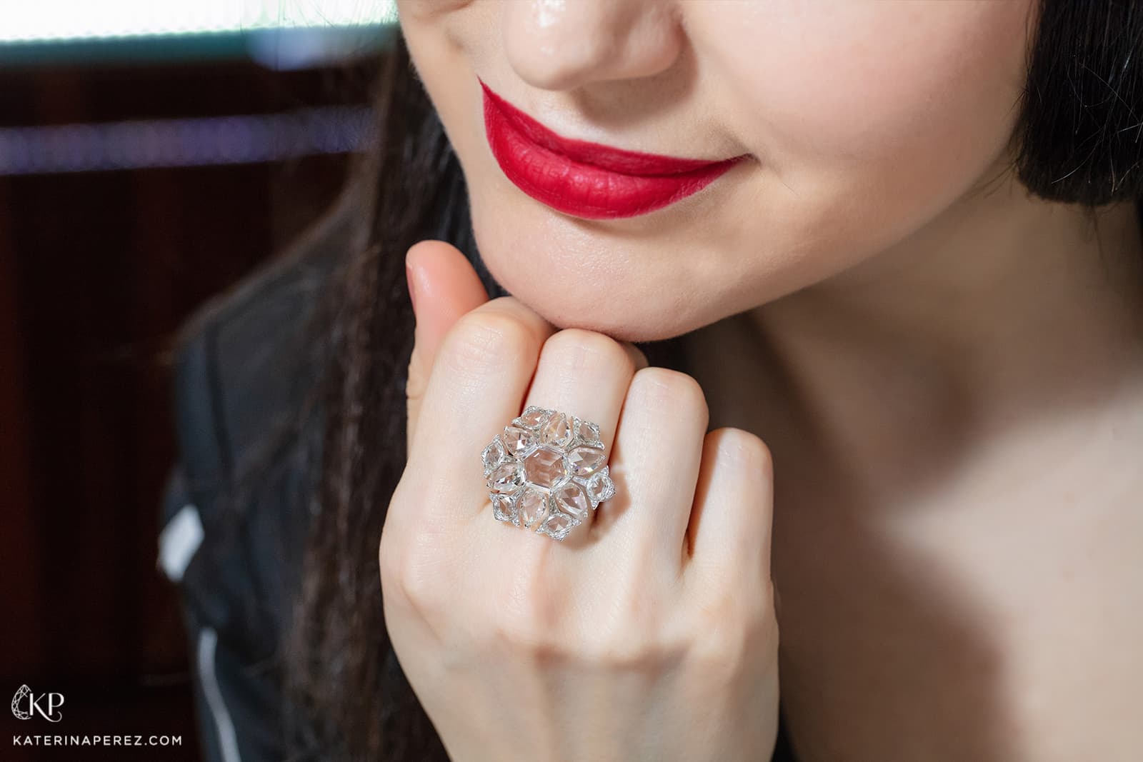 VAK ring with hexagonal cut G colour VS1 clarity diamond and accenting diamonds