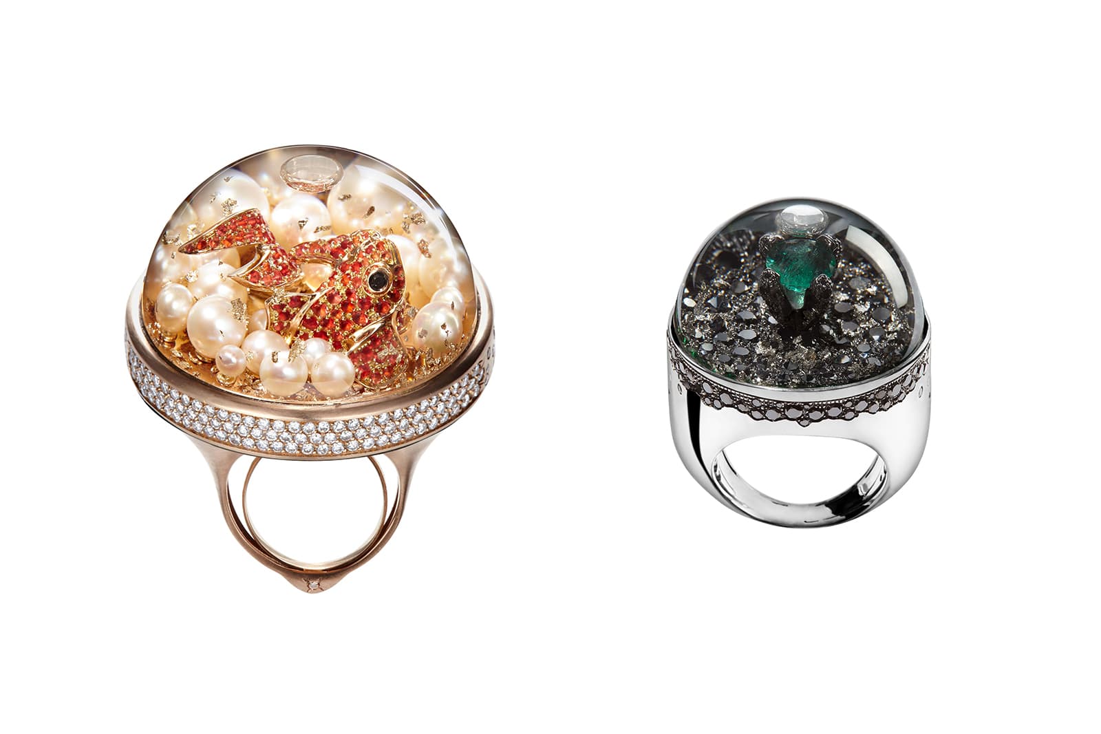  Dreamboule rings with sapphire glass, filled with 'Dream Solution' with pearls, diamonds and orange sapphires in rose gold, and black  diamonds and emeralds in white gold