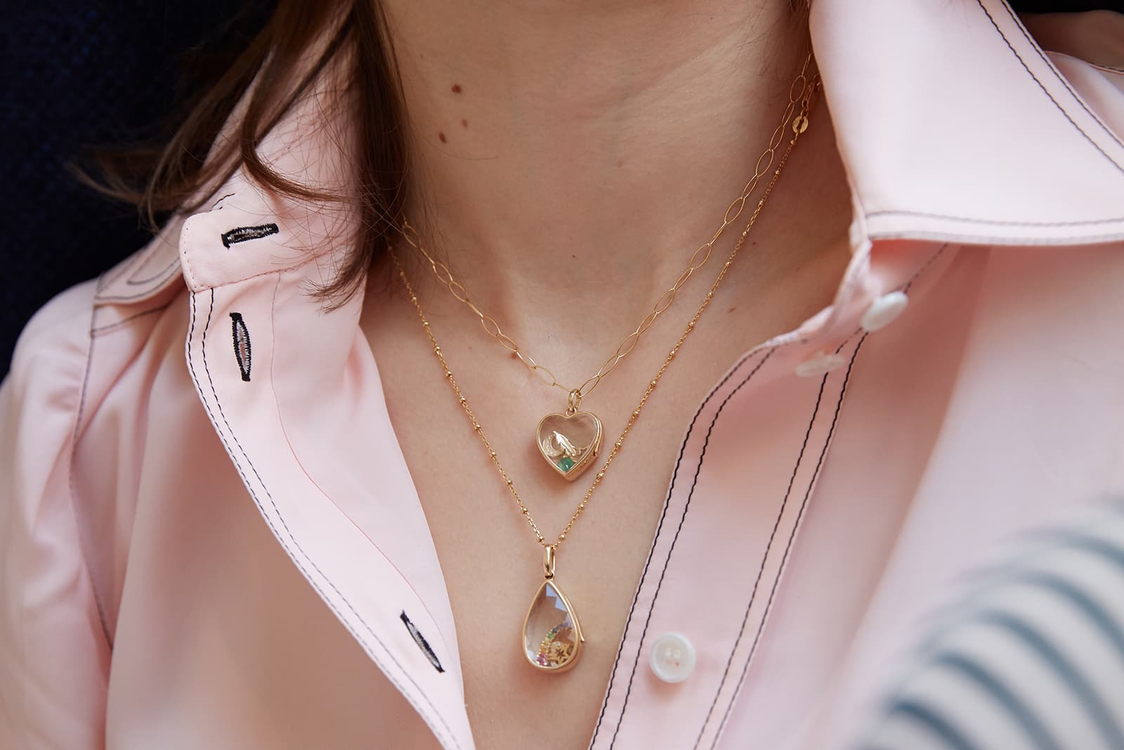  Loquet pendants with sapphire glass and multi-gemstone charms in yellow gold
