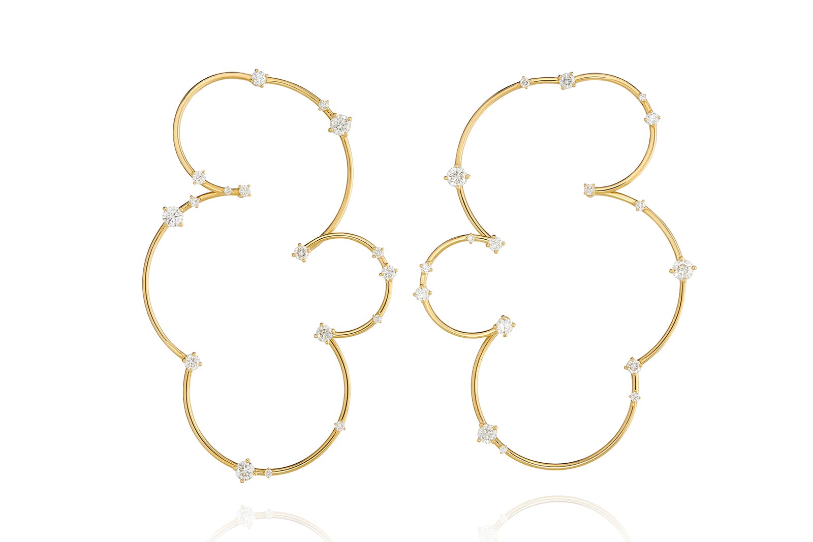   Fernando Jorge’s Aerial collection Contortionist earrings with diamonds in yellow gold