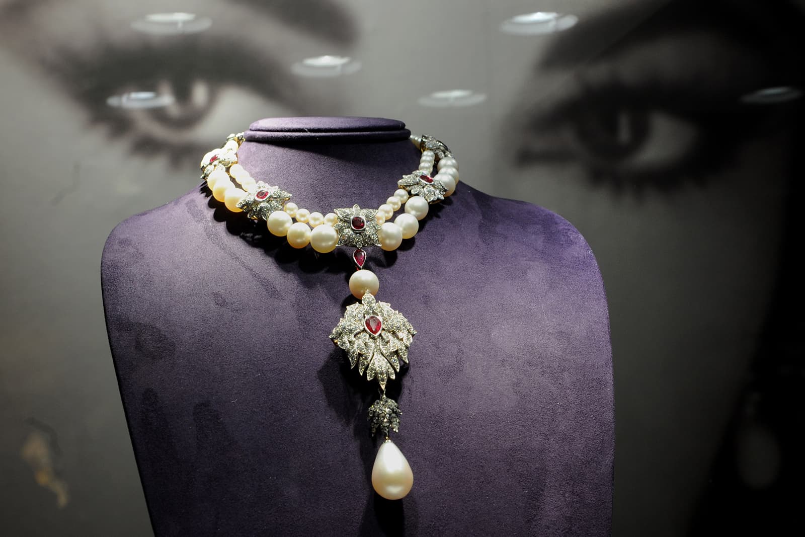 Elizabeth Taylor's La Peregrina Pearl necklace by Cartier with 55.95ct pear shaped pearl, accenting pearls, diamonds, and rubies
