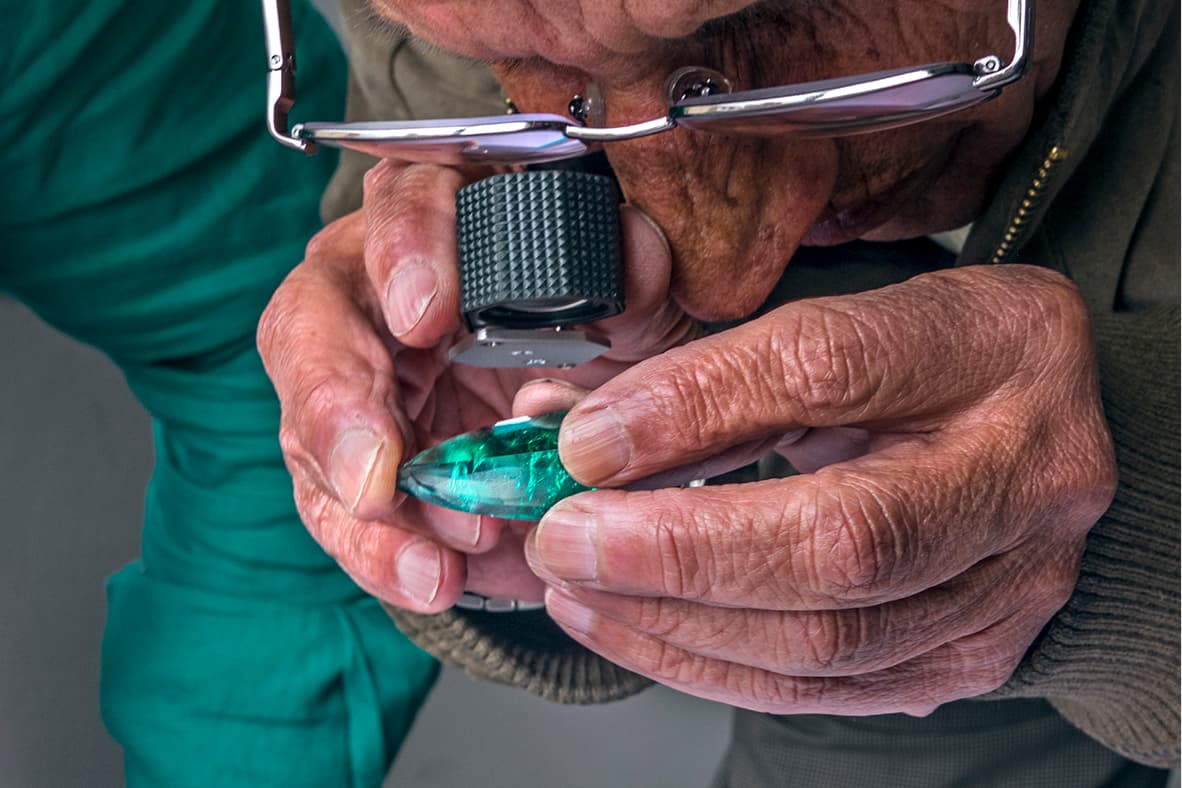 IEEX Colombian emerald being examined