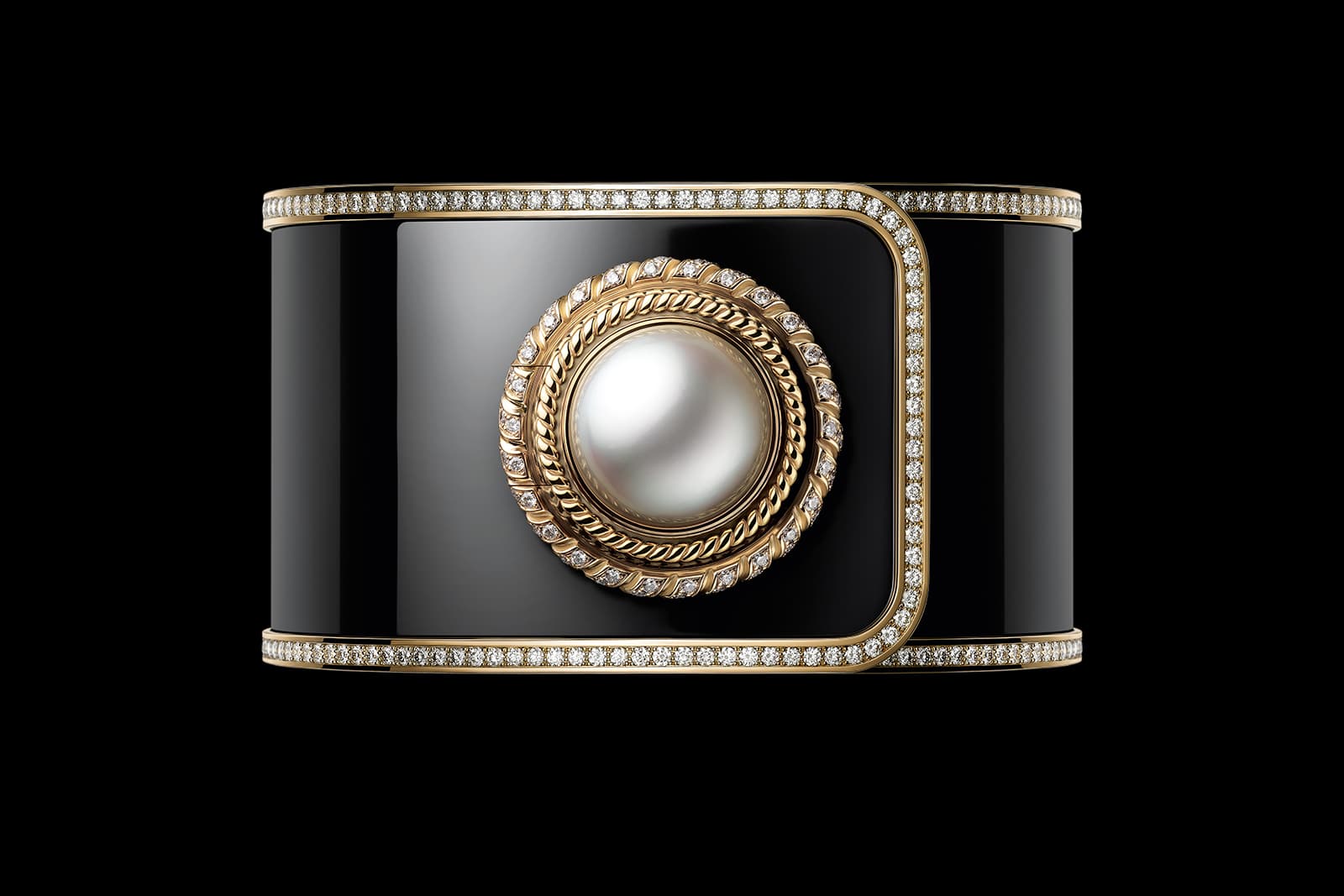Opening the Australian pearl "button" reveals the hidden watch dial