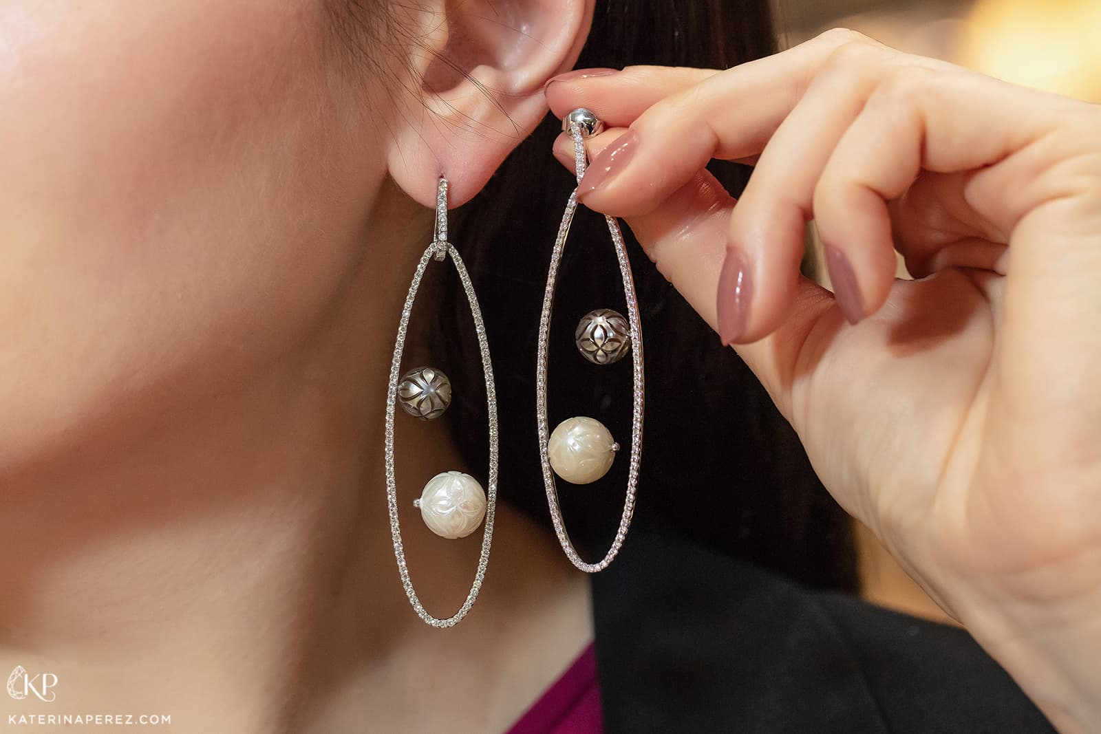 Hairaat carved pearl earrings