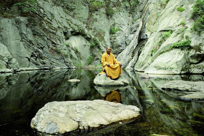  A powerful photo of a monk meditating inspired Christina to create the Shaolin earrings