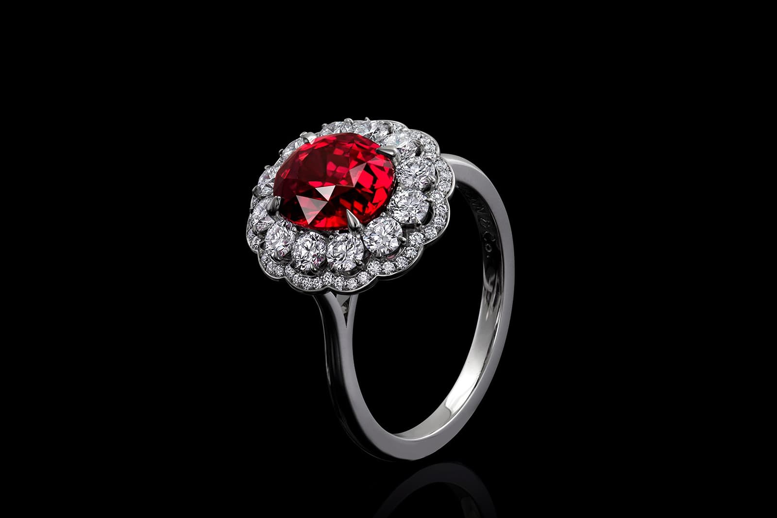  Jeremy's halo ring is designed to accentuate the natural beauty of the exceptional Mozambique ruby