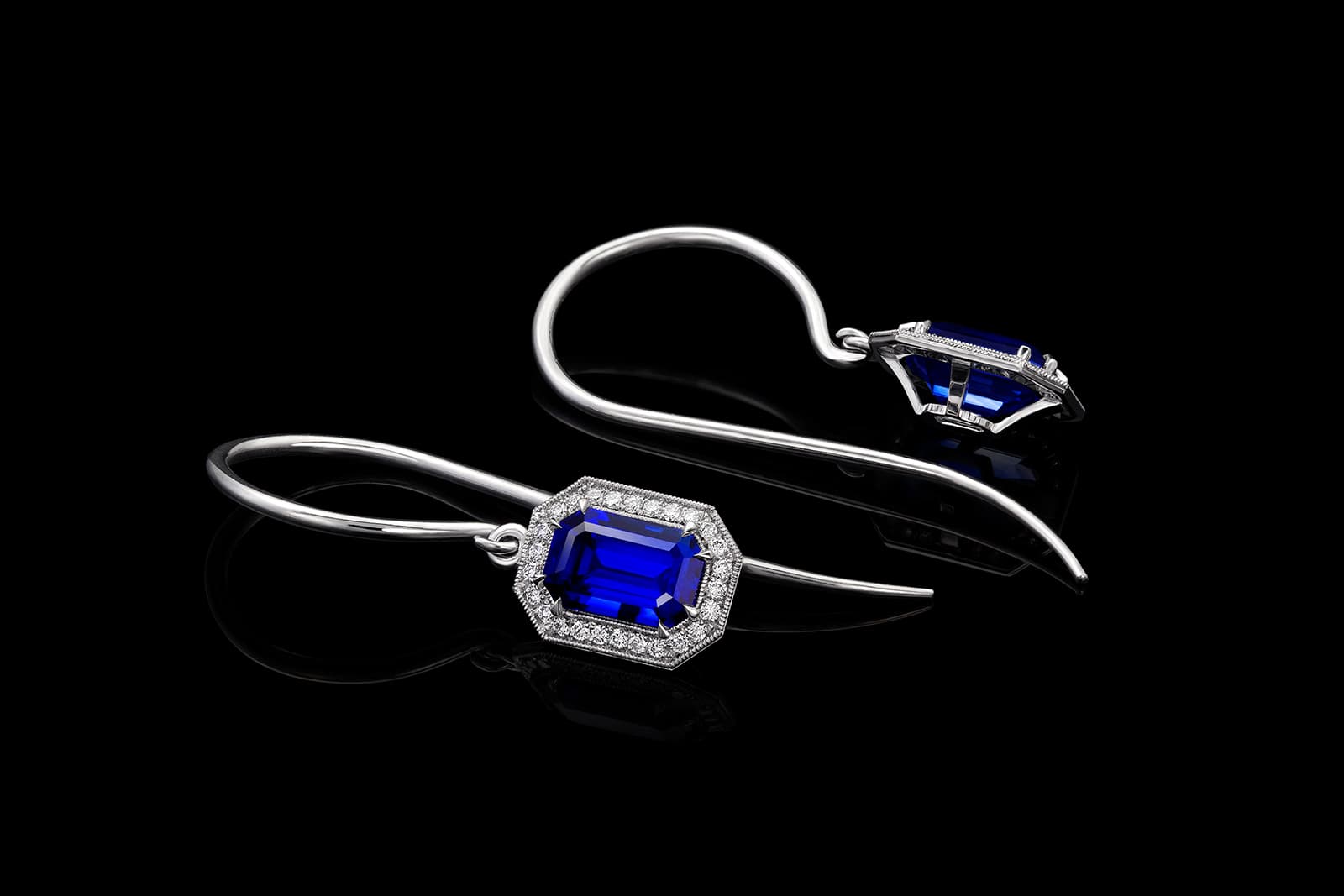 Jeremy's drop earrings feature a matched pair of 1.45-carat emerald cut blue sapphires from Sri Lanka