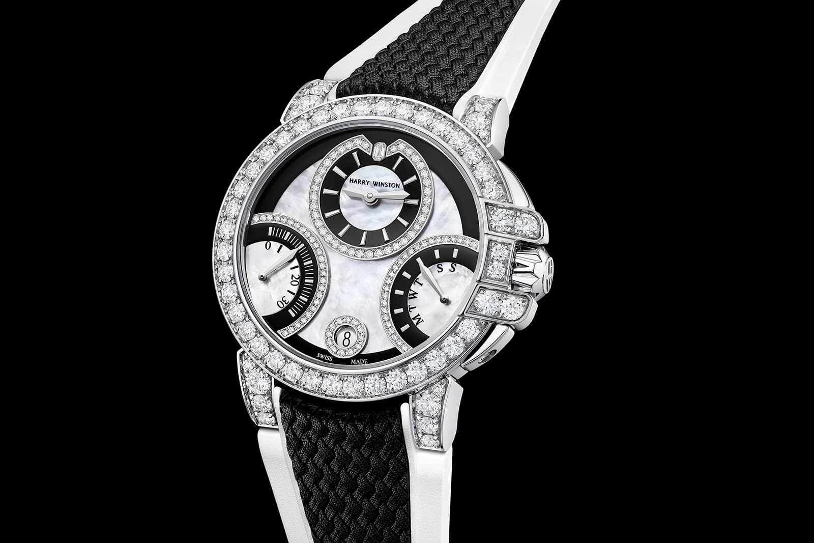  The dial features a dramatic combination of diamonds, mother-of-pearl and black lacquer