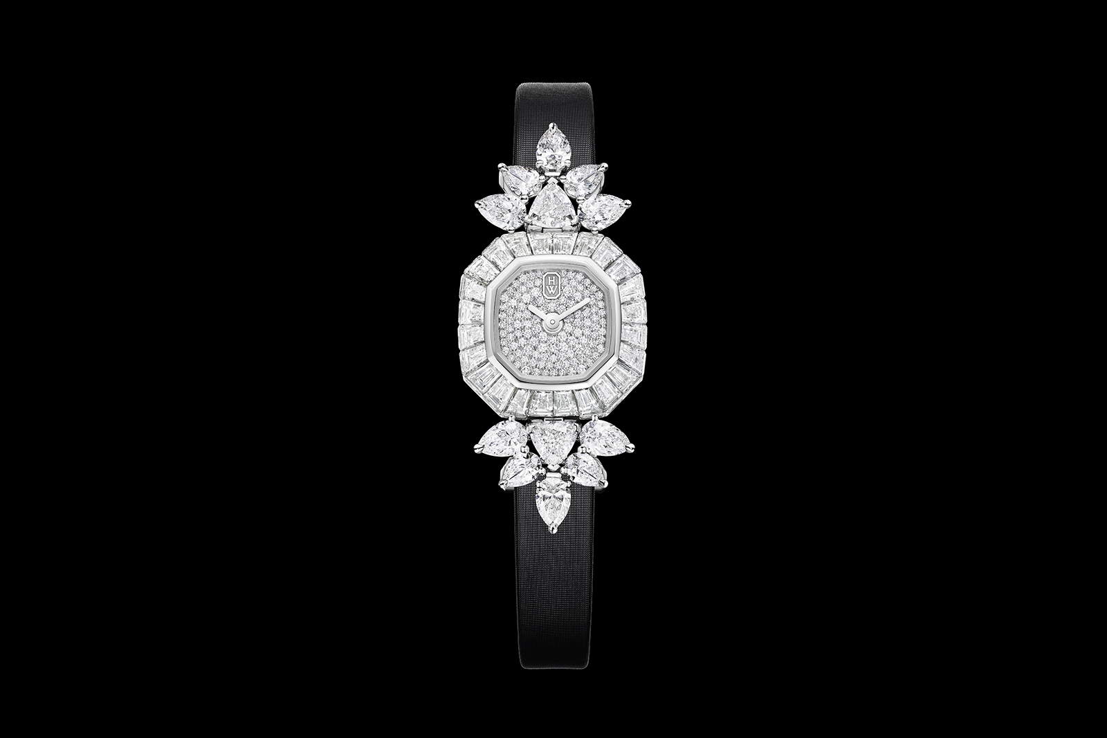  Baguette-cut stones are invisibly set to create an elegant halo around the fully set diamond dial
