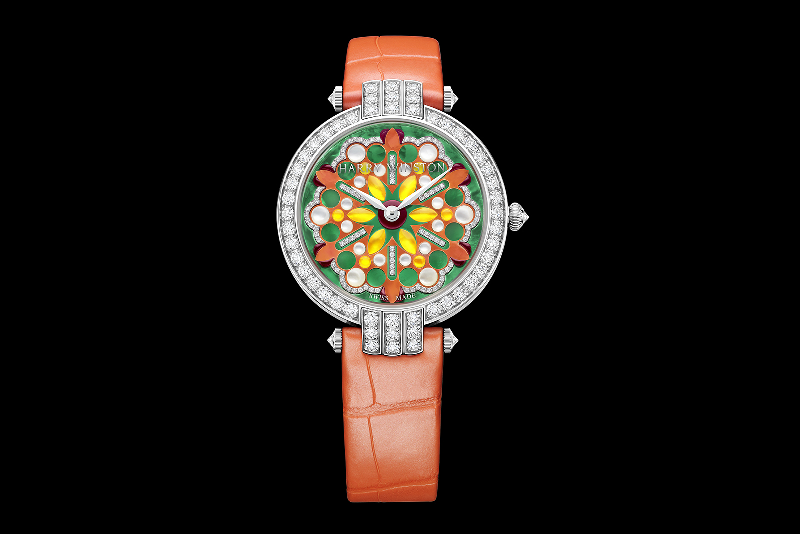  Round diamonds frame the dial and accent the lugs
