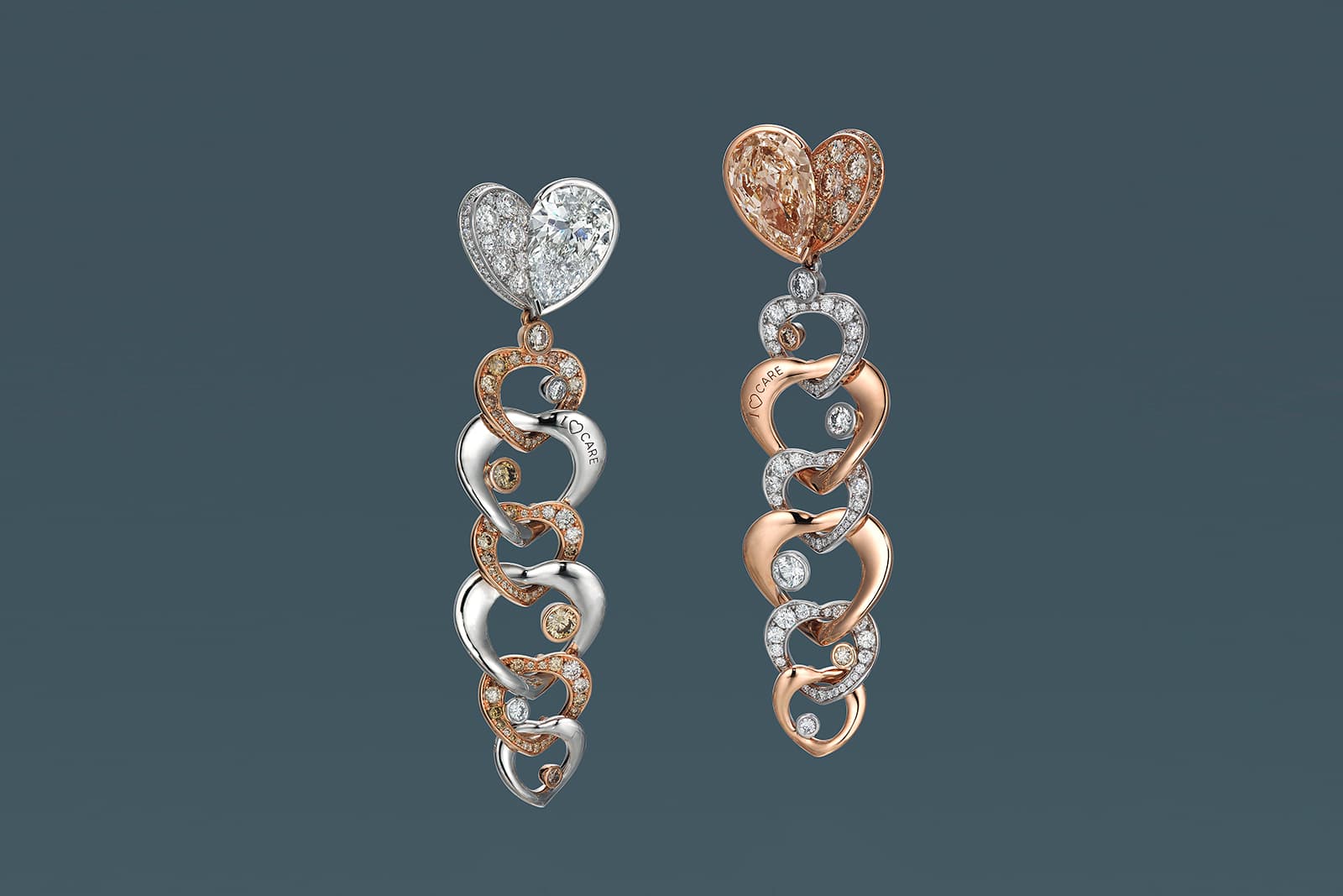  Set with Fancy colour and colourless diamonds, all proceeds from the sale of these whimsical heart-inspired Anna Hu earrings will go to support frontline health workers fighting COVID-19