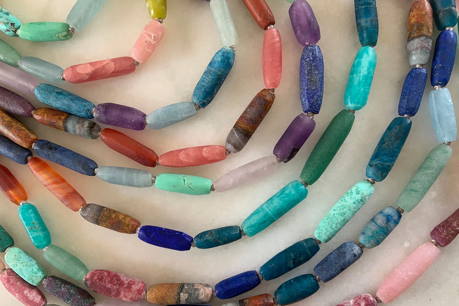  Brooke's new beaded gemstone necklaces, each of which features a unique combination of stones
