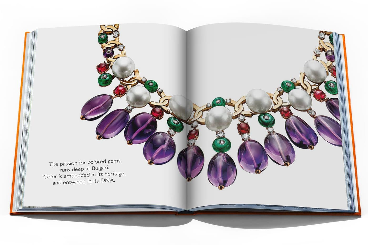  Pages from the coffee table book Bvlgari: The Joy of Gems, featuring one of the Roman jeweller's colourful amethyst high jewellery creations