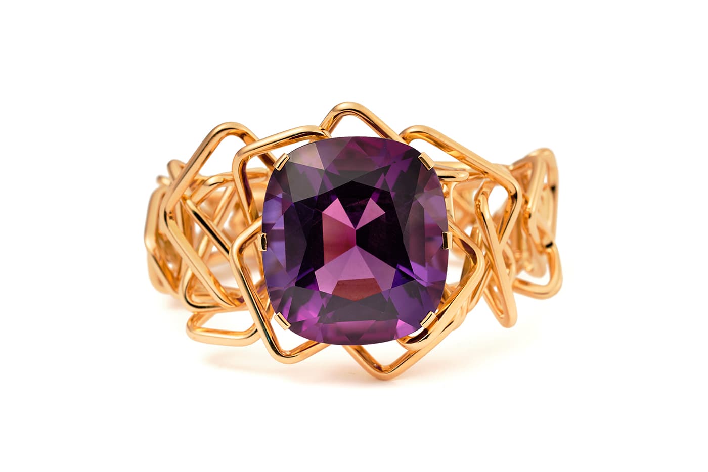  Disorient amethyst bangle in 18 carat gold by Amy Burton, jewellery designer for Hancocks 