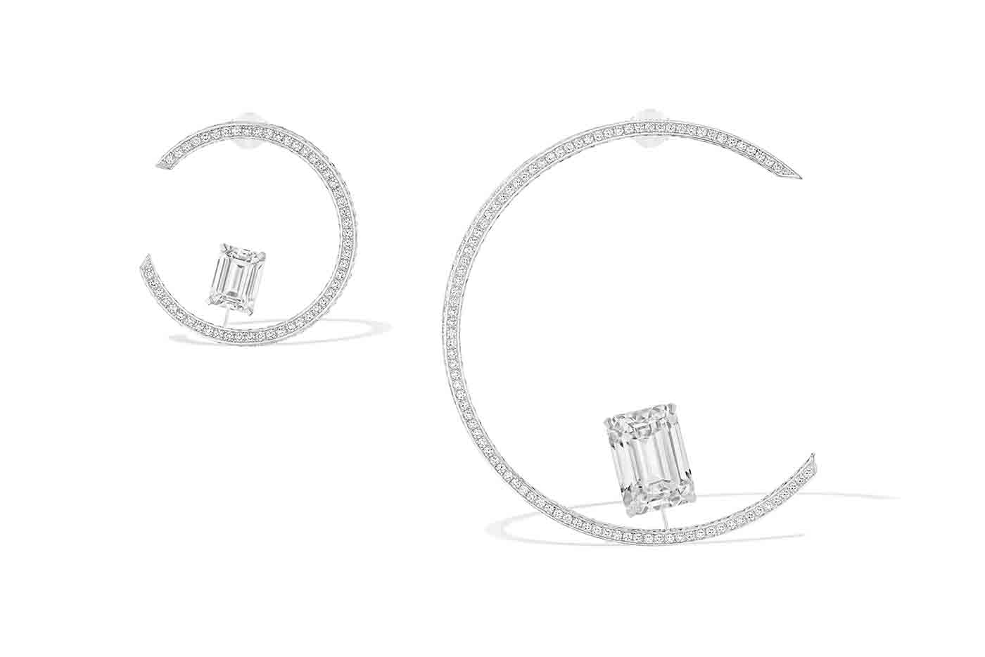  Messika Voltige Bascules diamond high jewellery hoop earrings, showcasing two emerald cut diamonds