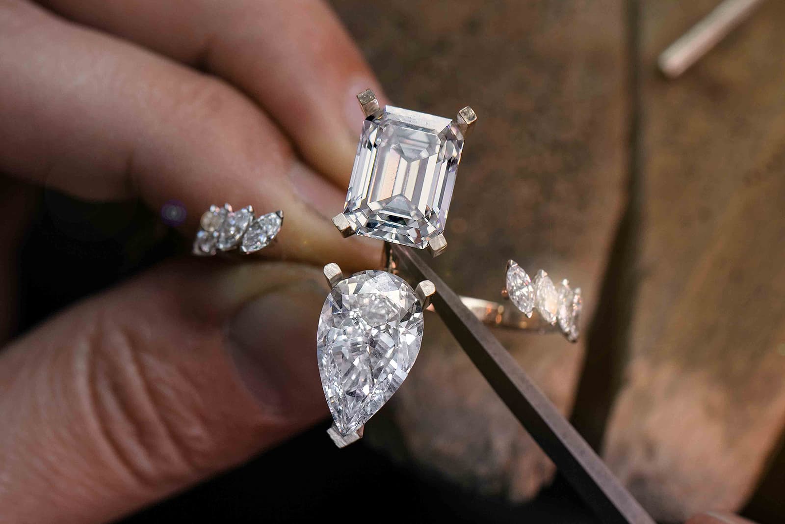  The row of marquise diamonds around the band remains open, creating the illusion of empty space
