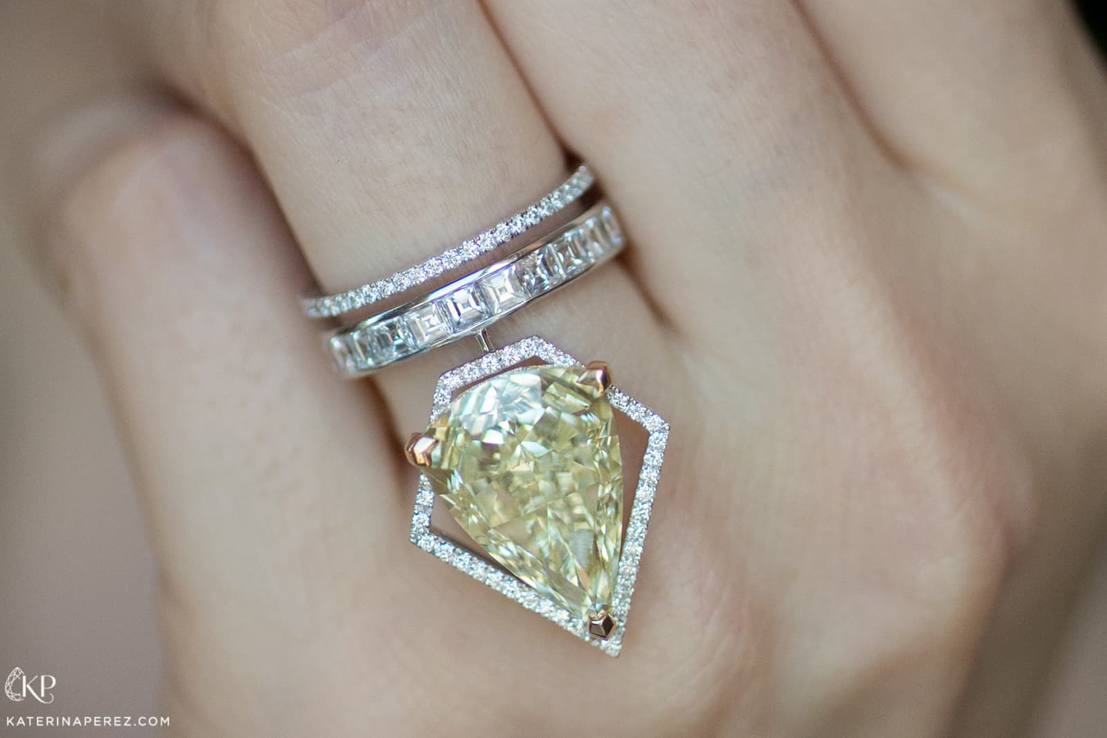 Messika's Voltige Trapézistes ring is set with a 10.19 carat pear shape Fancy Yellow diamond