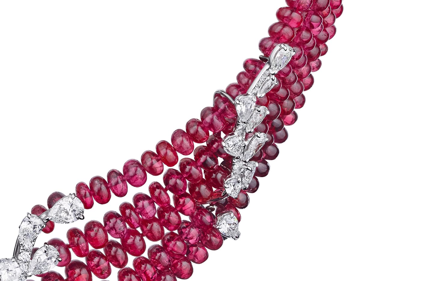 Nestled among the spinel beads are diamond branches 