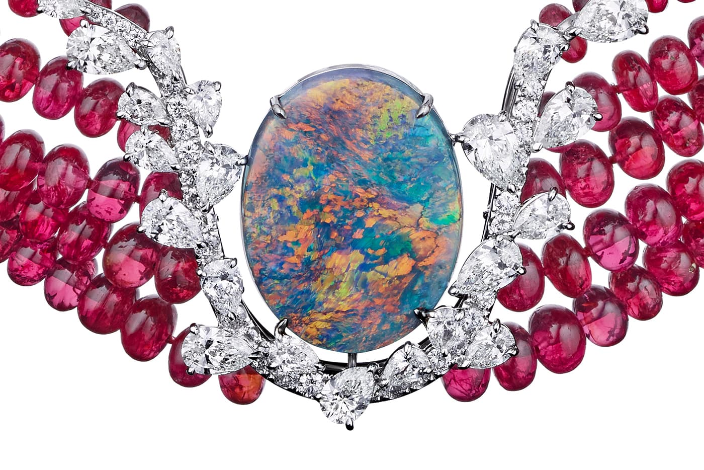 The 15.04 carat Australian black opal glows with the myriad reflections of aurora borealis