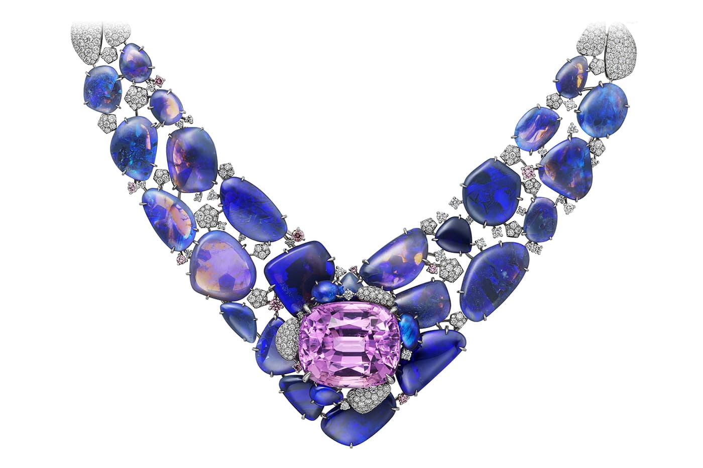 The intense pink colour of the 71.80 carat kunzite is streaked with purple, complementing the black opals