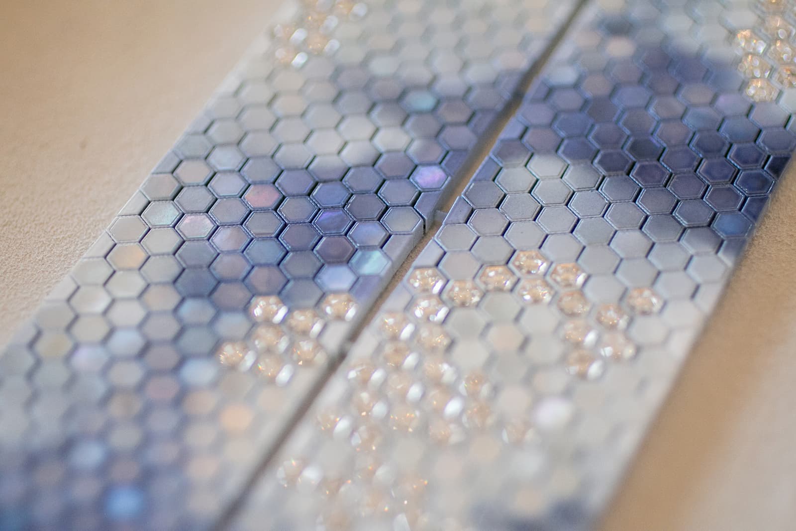  The lifelike scene was achieved by combining miniature tiles of mother of pearl and diamonds, overlaid with slate-coloured lacquer, applied by hand with an airbrush