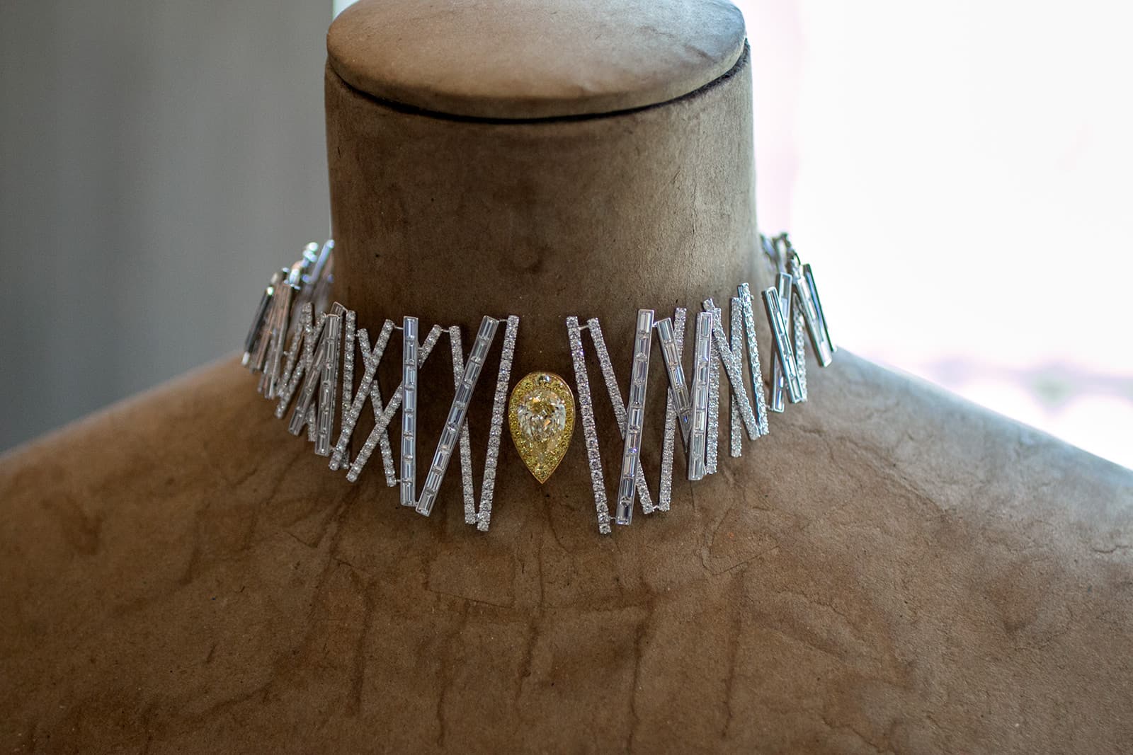 Messika's Equilizer necklace, from the new Voltige high jewellery collection, stars a pear-shaped yellow diamond that appears to be suspended in space